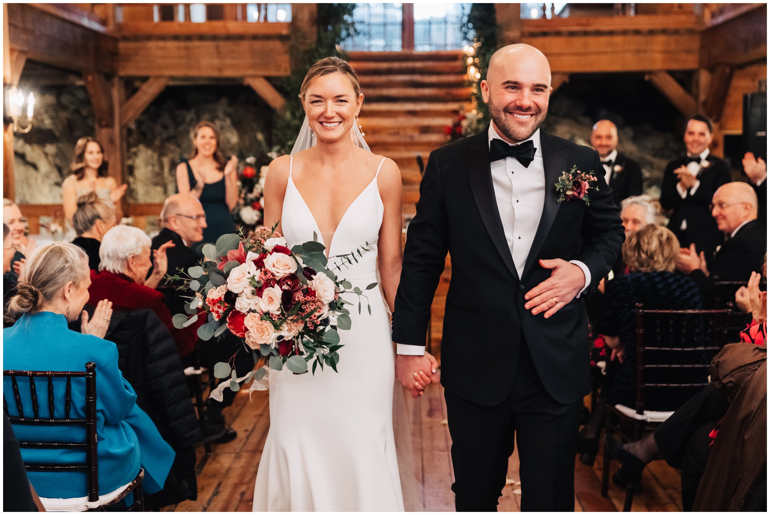 bride and groom walk down the aisle at red lion inn cohasset ma